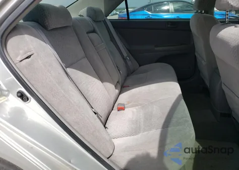 2003 Toyota Camry Le z USA, uszkodzony, nr VIN 4T1BE30K73U709871